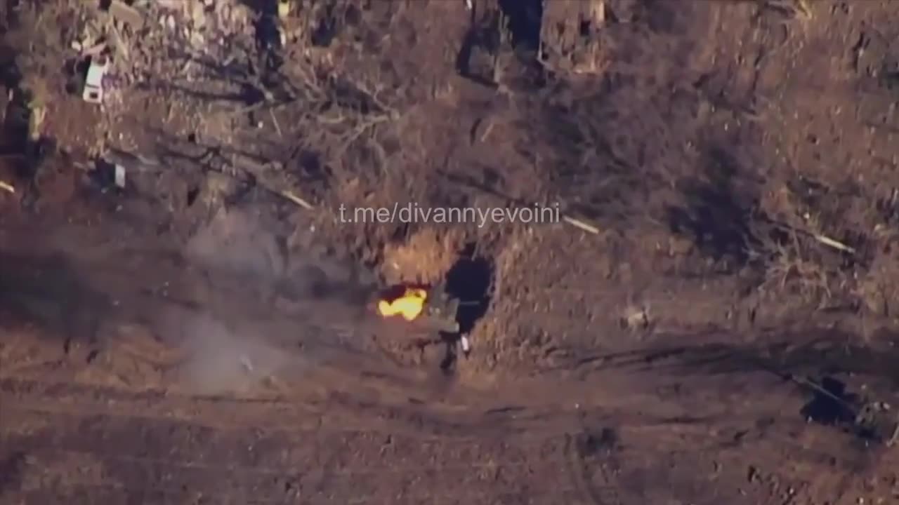 A direct hit from a Russian FPV kamikaze drone sets a Ukrainian tank ablaze