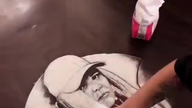 Artist Creates Portrait of Famous Musician Using Sugar