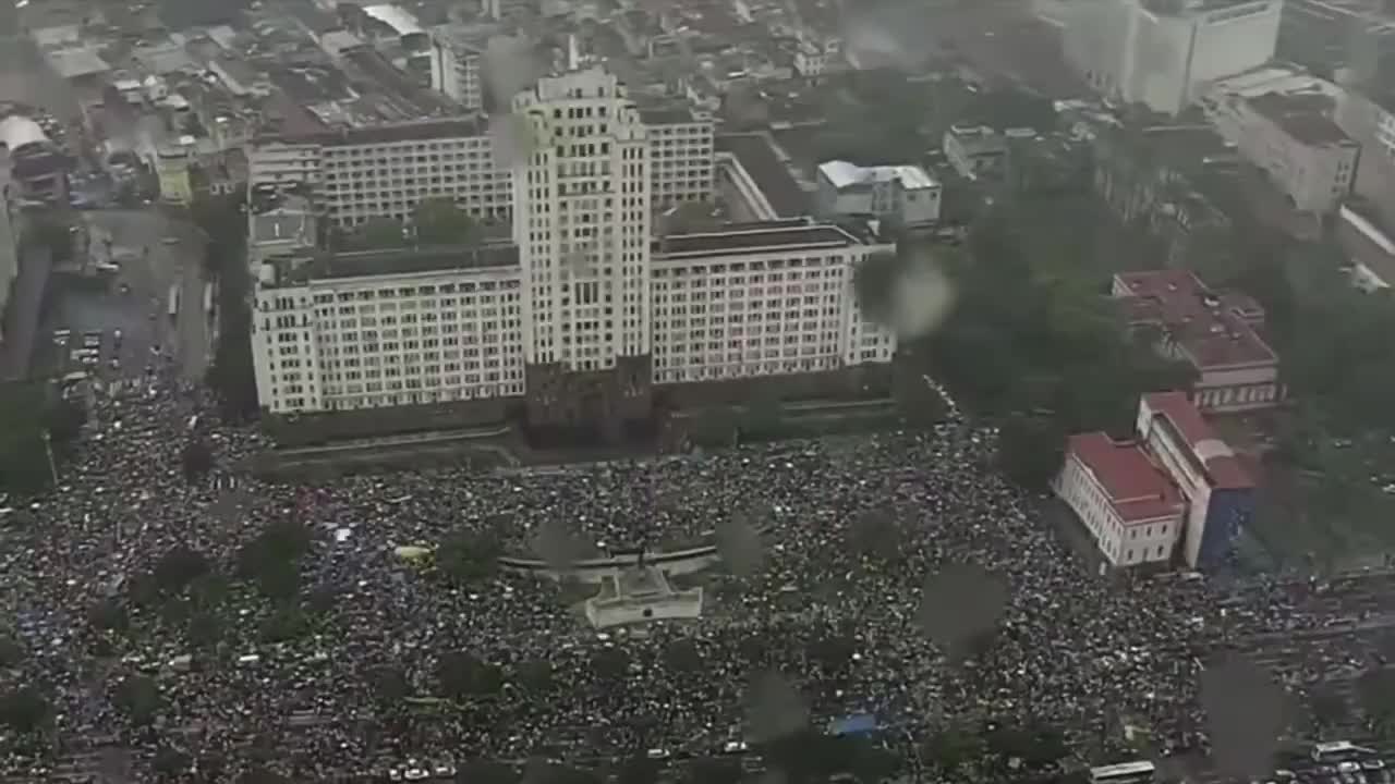 Helicopter footage of massive crowd assembled at the Brazilian military command