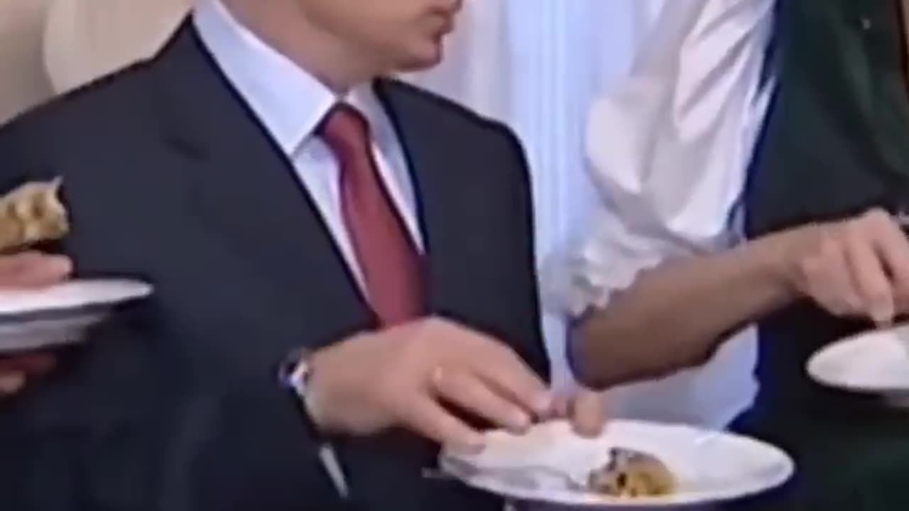 Vladimir Putin surrounded by women