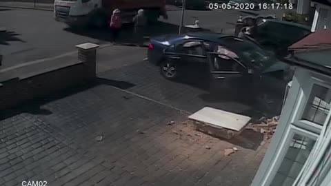 CCTV captures moment a car crashed into a house