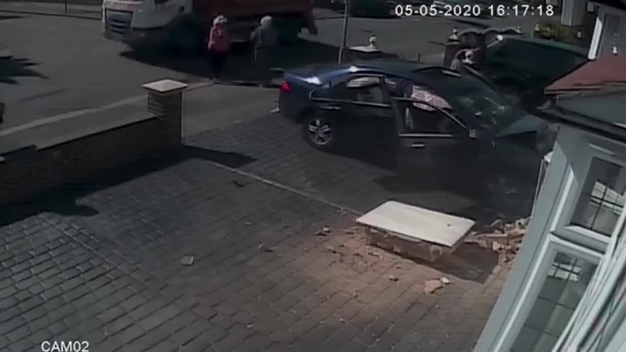 CCTV captures moment a car crashed into a house