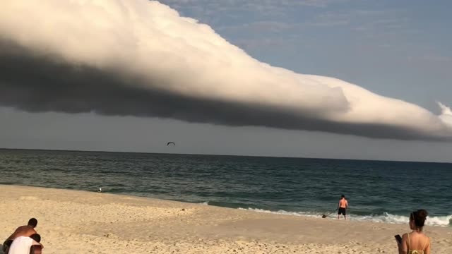 Huge Cloud Covering the Beach