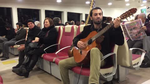 guitar man on the ship, Leyenda Asturias on the Ship