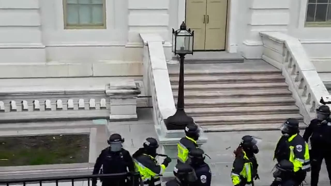 DC cops retreat from position on upper west terrace around 2:30 on January 6.