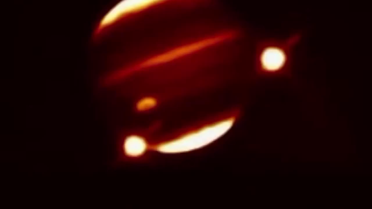 How does jupiter protect Earth from comets and asteroids!