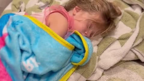 Mom discovers her toddler asleep on bathroom floor for the sweetest reason