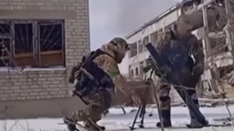 UKRAINIAN SOLDIERS WITH MORTAR ARE CENTERED BY RETURN FIRE IN BAKHMUT