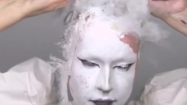 Makeup Artist Uses Lit Candles to Create Unusual Look Then Takes it off