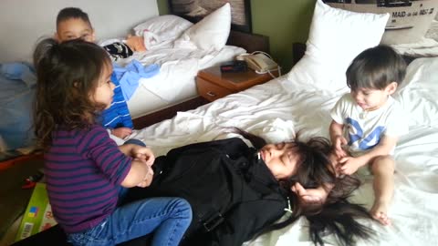 A mother play's dead as her baby became shocked 