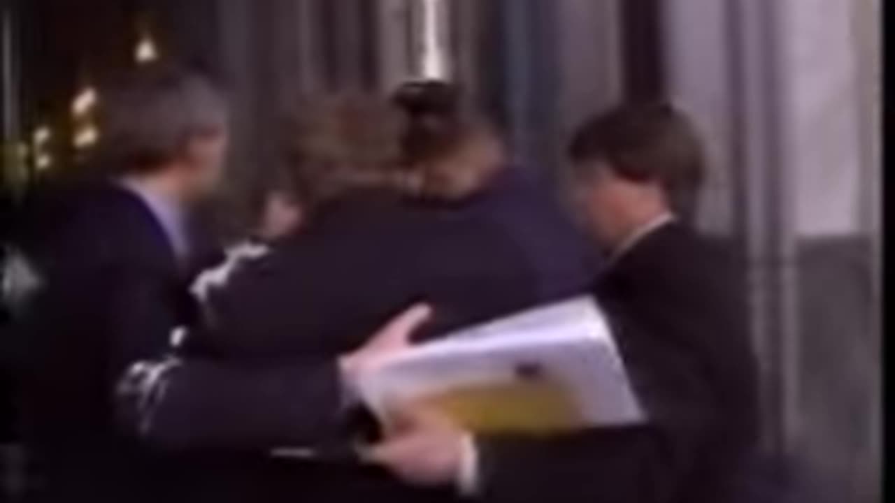 Bill Gates gets a cream pie to the face while walking into conference