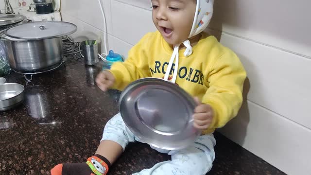 Baby in kitchen 😂