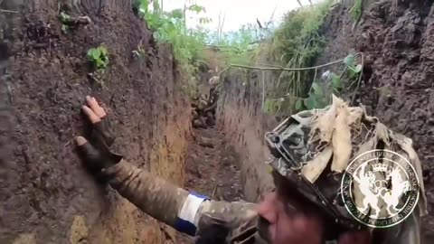 Ukrainian soldier is buried in his trench when an enemy artillery shell lands