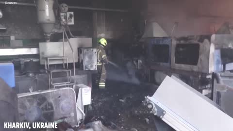 Firefighters tackle HUGE blaze at Kharkiv factory hit by Russian bombs