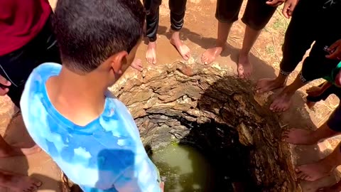 Children enjoy village || children water stand