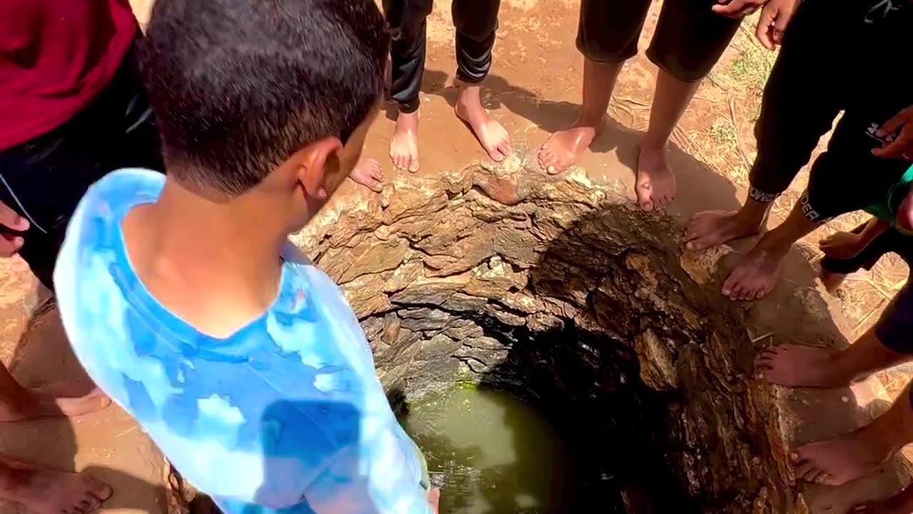 Children enjoy village || children water stand