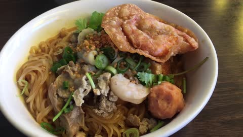 Eating Phnomh Penh noodle Cambodian Food Experience