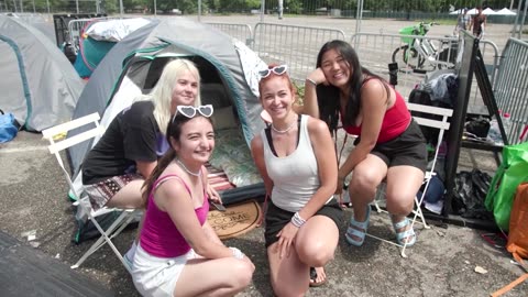 Swifties camp in tents outside stadium in Milan