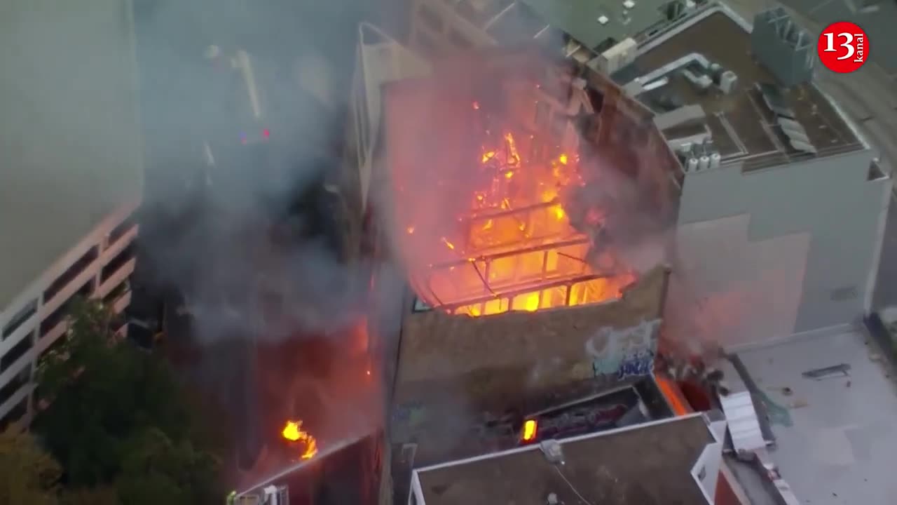 Witness recalls loud crash, ground shaking when burning Sydney building walls collapsed