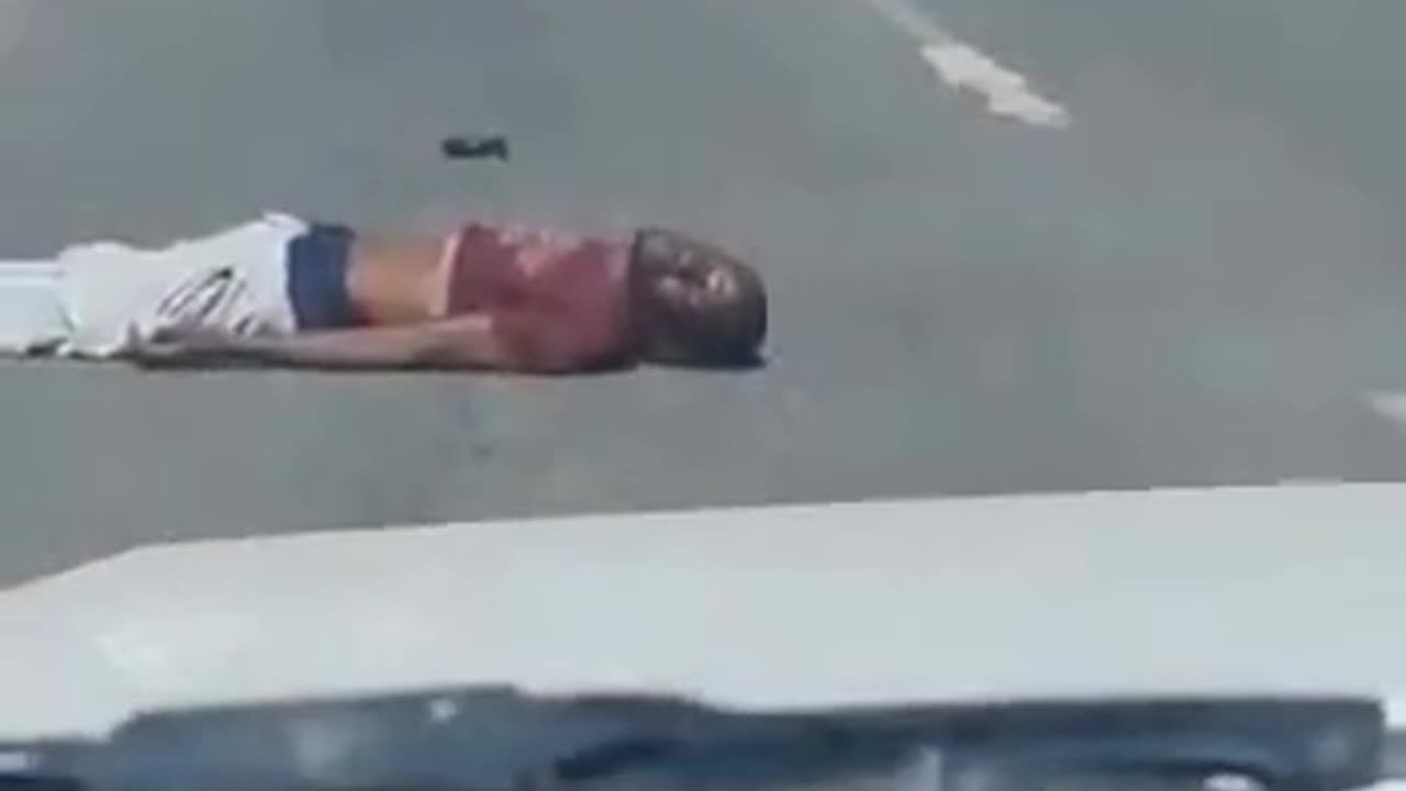 Guy Falls Off The Roof Of Moving Car - Don't do this.