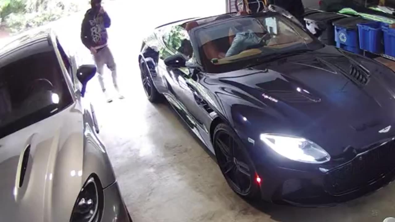 Westport man gets carjacked inside his garage. He does have a really nice car though or did..