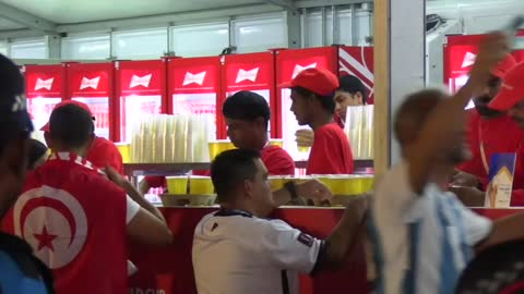 Bottoms up! Qatar serves first beers at World Cup fan zone.