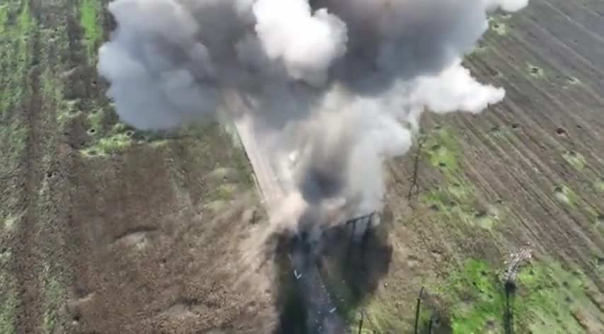 Ukrainian Drone Dropping Grenade On Russian Mines Stockpile