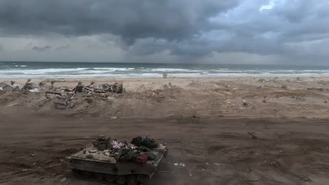 IDF Armored Vehicles Driving Along The Coast of Southern Gaza