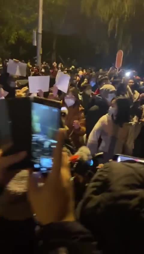 Tiananmen Square in Beijing chanting: “We want universal values”