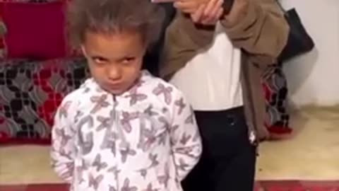 Hamas supporter makes this video with her two young children.