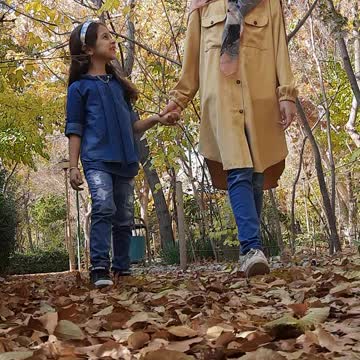 Romantic walk of two sisters