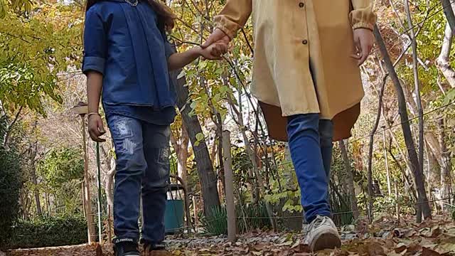 Romantic walk of two sisters