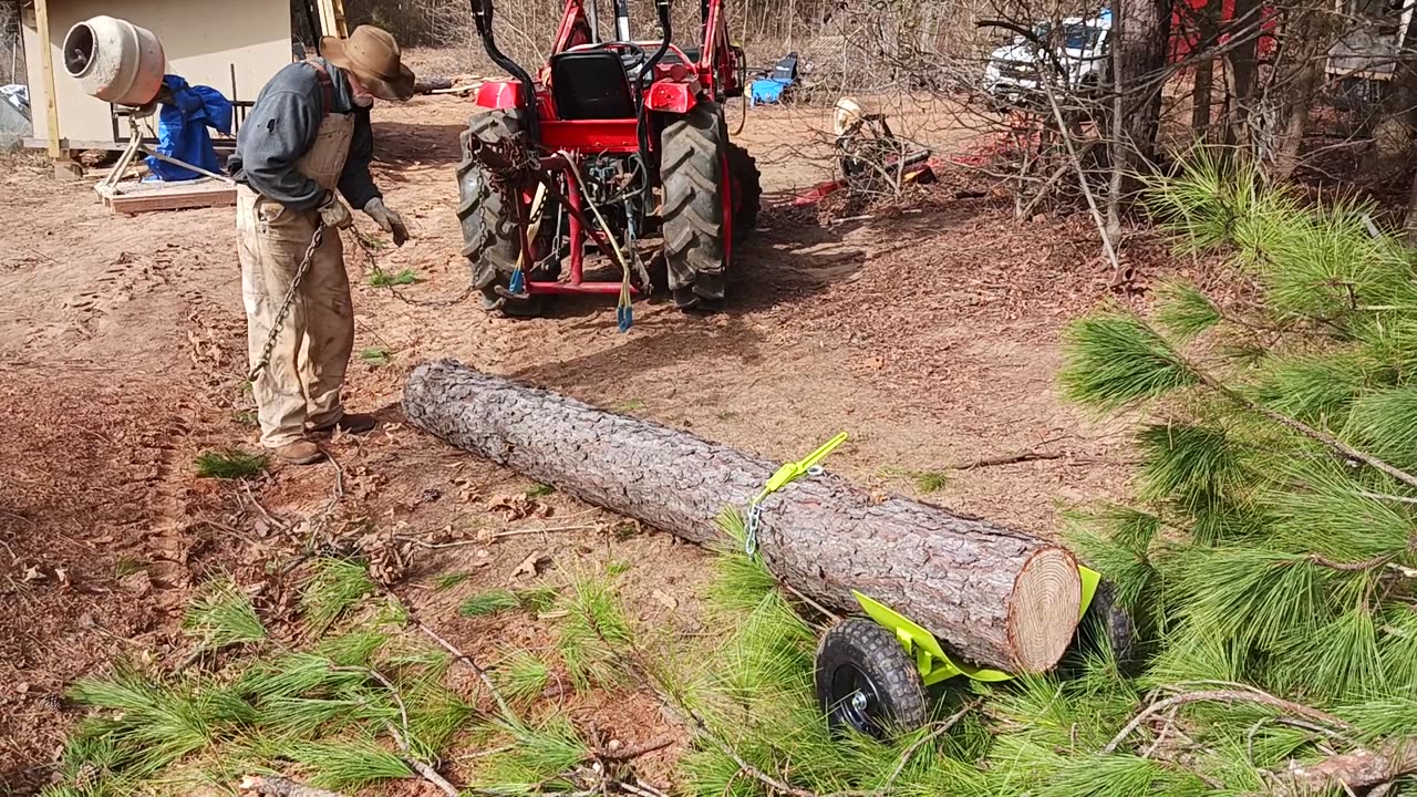 What do you do when a log is too heavy for the pallet forks on the tractor? Watch and learn.