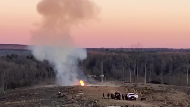 HUGE tannerite charge blows a car in half