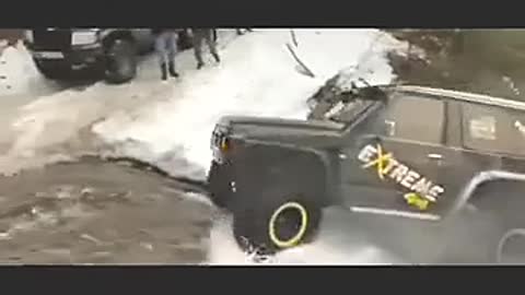 Drive an off-road vehicle over a hill.