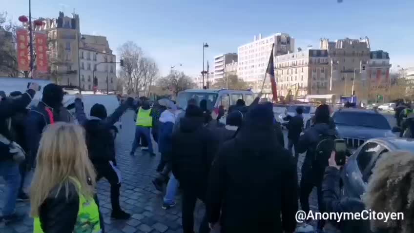 NWO VAN FLEES FROM PROTESTERS IN PARIS, FRANCE