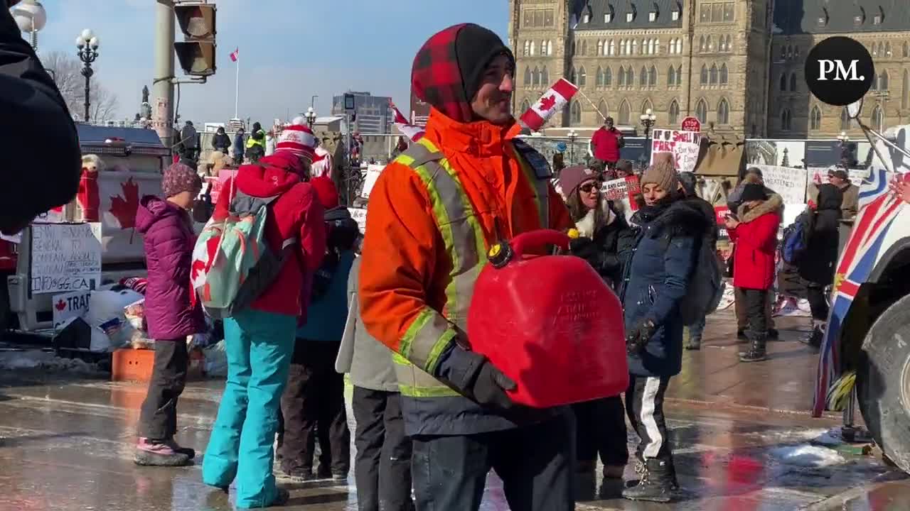 Freedom convoy protesters in Ottawa are carrying around jerrycans in protest to the arrests of individuals with fuel on their person and seizures of fuel and propane last night