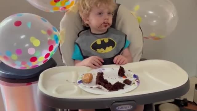 Baby Fails to Keep His Eyes Open as He Eats His Birthday Cake