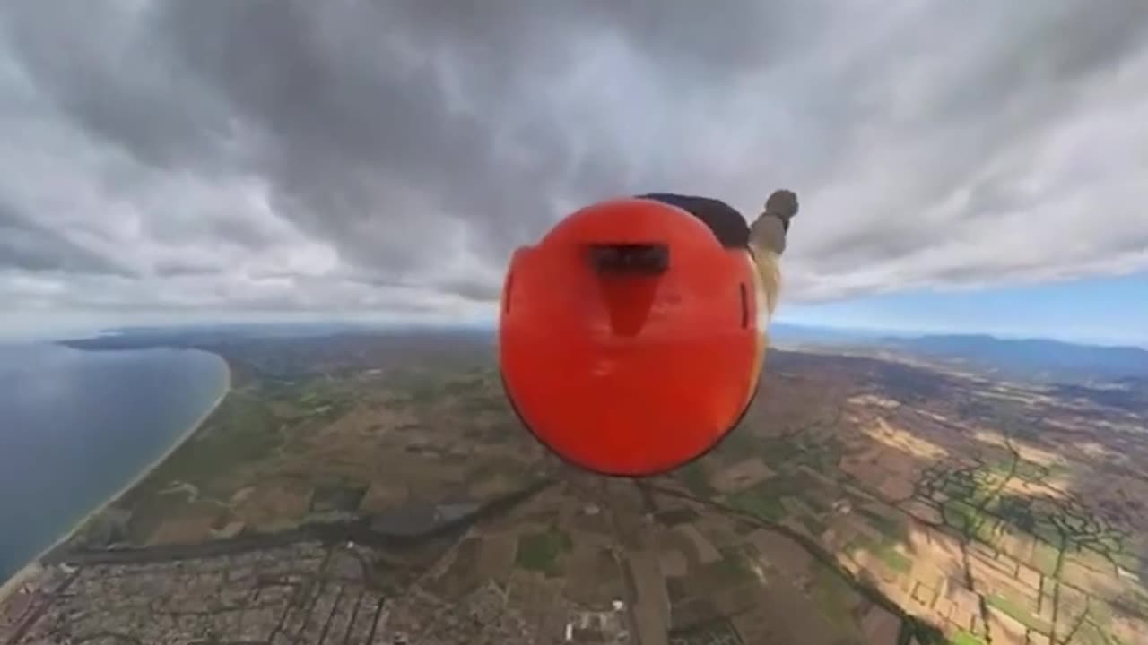 Skydiver free-falls through a cloud during his jump back to Earth #Shorts