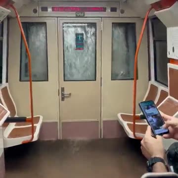 Torrential rains batter central Spain, water surges into subway car in Madrid