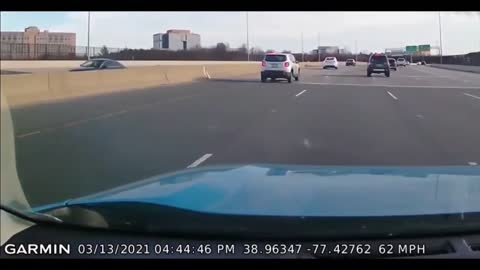 Black car cuts off white car and almost causes a collision