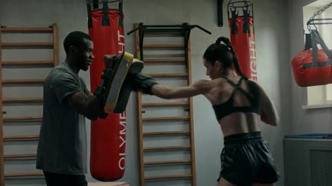 Woman Practicing Kick Boxing