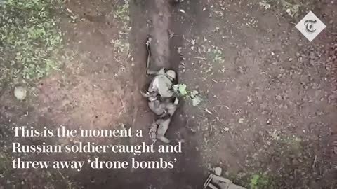 Moment Russian soldier catches and throws away Ukrainian 'drone bombs'