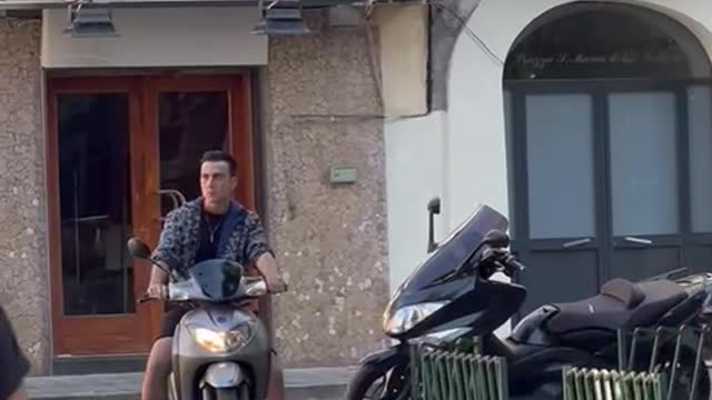 Guy Pulls up on Moped and Fires Handgun for Netflix Show