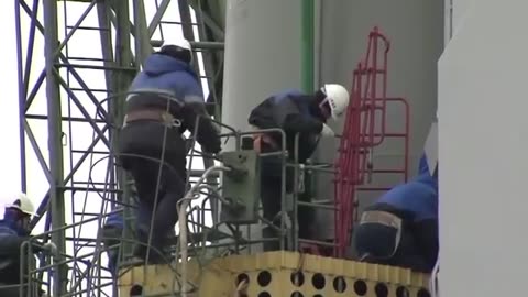 Expedition 27 Crew Prepares for Launch as their Soyuz Rocket Move to Launch Pad