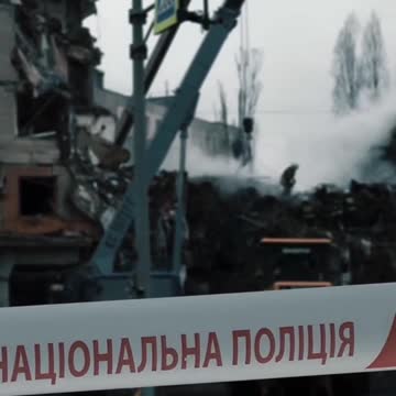 Aftermath of Russian Airstrikes on Apartment Building