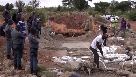 Six dead as illegal miners' standoff drags on in South Africa | REUTERS