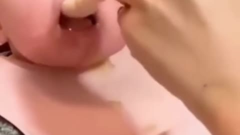 cute baby opening mouth to eat