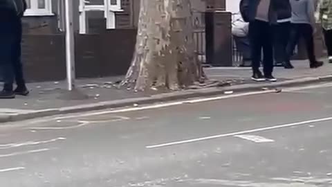 Armed police swooped on an East London college yesterday after two