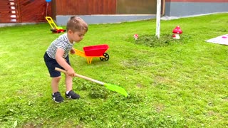 Akim helps to take care of the garden.